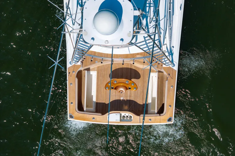  Yacht Photos Pics Overhead view of 2012 Cabo 44 Hardtop Express yacht on water.