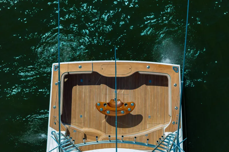  Yacht Photos Pics Overhead view of 2012 Cabo 44 Hardtop Express yacht deck on water.