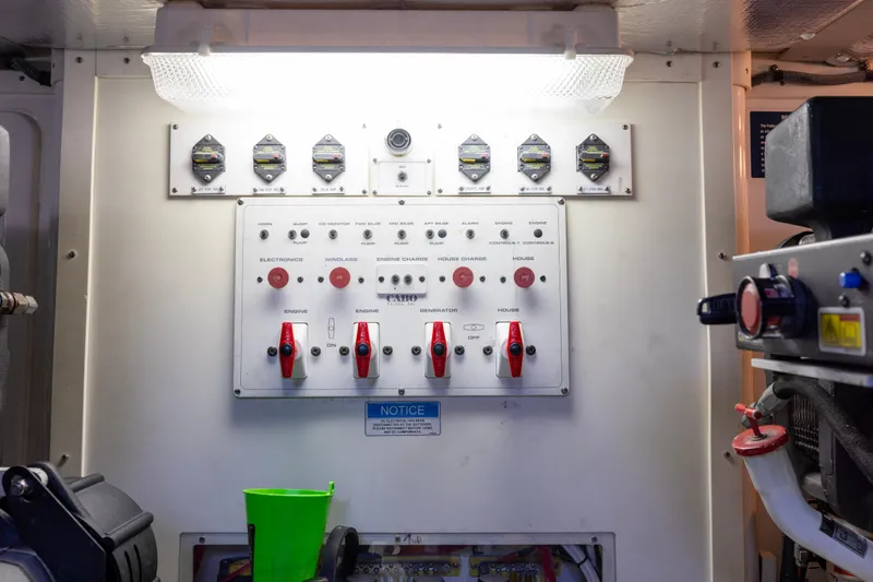  Yacht Photos Pics Electrical control panel inside 2012 Cabo 44 Hardtop Express boat engine room.