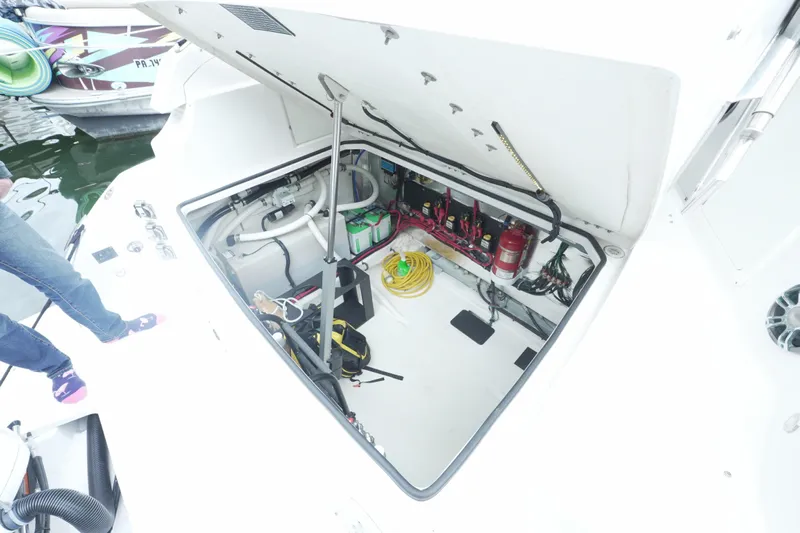  Yacht Photos Pics Open engine compartment of 2021 Regal 33 XO boat, showing equipment and wiring.