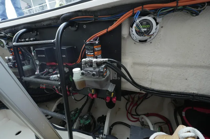  Yacht Photos Pics Engine compartment of a 2021 Regal 33 XO boat, showcasing wiring and components.