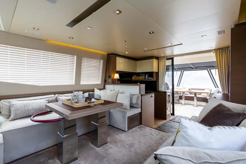  Yacht Photos Pics Luxurious interior of 2017 Beneteau Monte Carlo 6S yacht with modern furnishings.