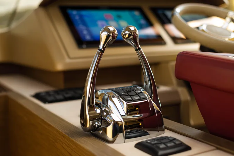  Yacht Photos Pics Control panel of 2017 Beneteau Monte Carlo 6S yacht with chrome throttle levers.