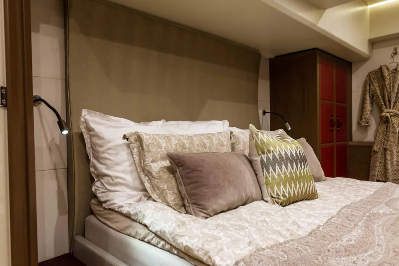  Yacht Photos Pics Luxurious bedroom interior of 2017 Beneteau Monte Carlo 6S yacht with elegant bedding.