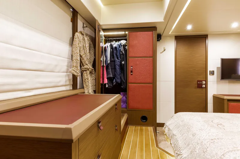  Yacht Photos Pics Luxurious cabin interior of 2017 Beneteau Monte Carlo 6S yacht with elegant wood finishes.