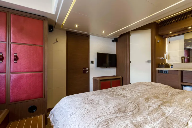  Yacht Photos Pics Luxurious bedroom interior of 2017 Beneteau Monte Carlo 6S yacht with modern amenities.