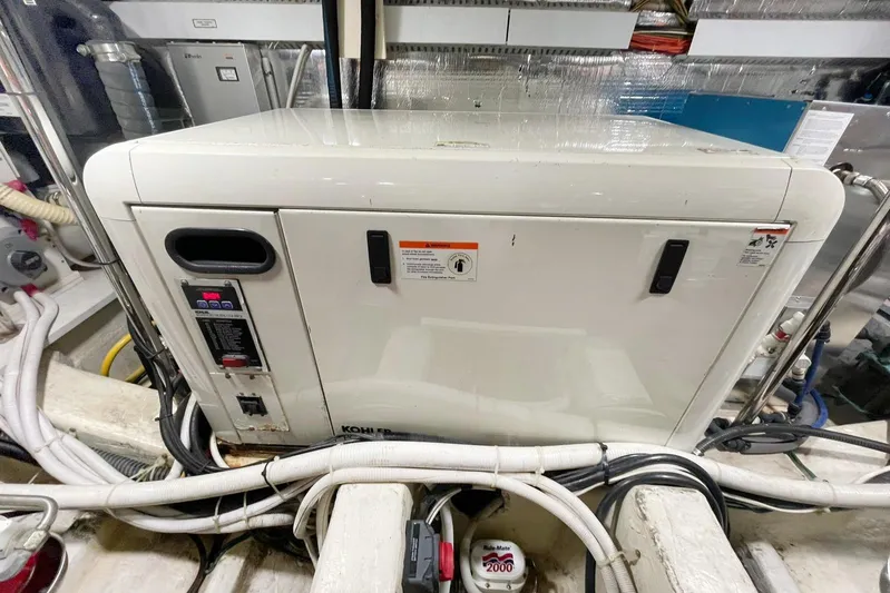 Susea Q Yacht Photos Pics Engine room of 2005 Carver 560 Voyager with Kohler generator and wiring.