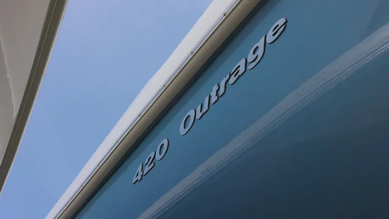  Yacht Photos Pics Close-up of 2016 Boston Whaler 420 Outrage boat nameplate.