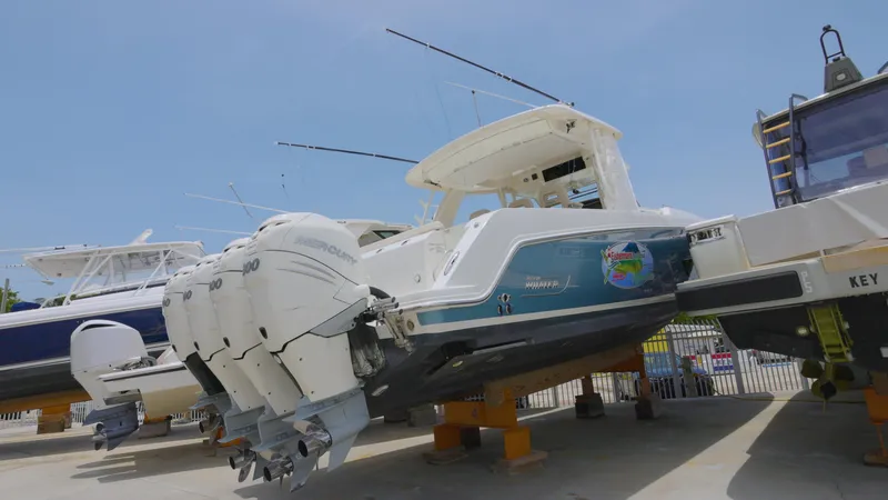  Yacht Photos Pics 2016 Boston Whaler 420 Outrage boat with triple outboard engines on display.