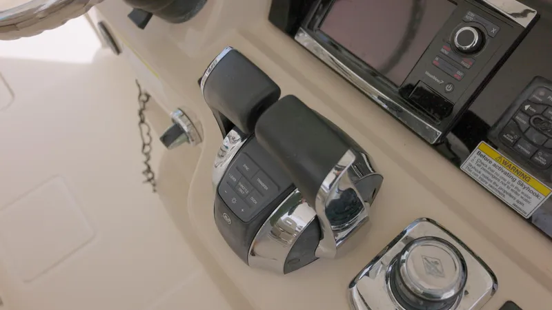 Yacht Photos Pics Close-up of the 2016 Boston Whaler 420 Outrage throttle controls and navigation system.