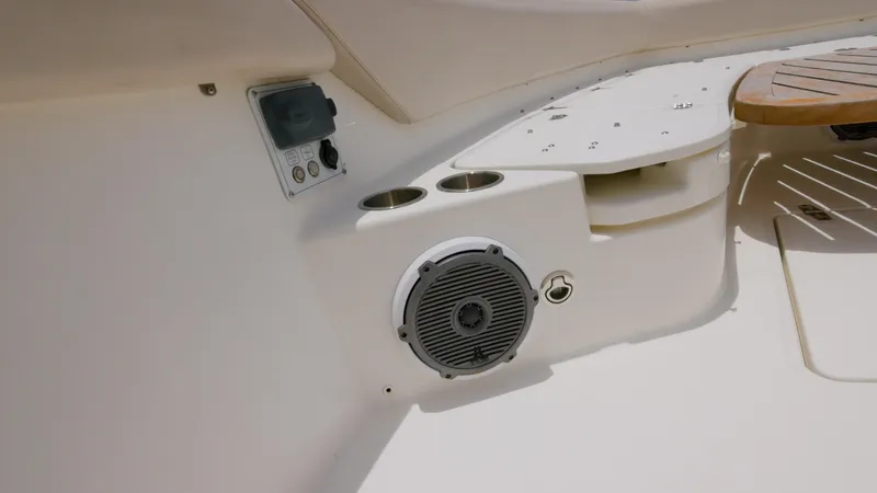  Yacht Photos Pics 2016 Boston Whaler 420 Outrage boat interior with speaker and cup holders.