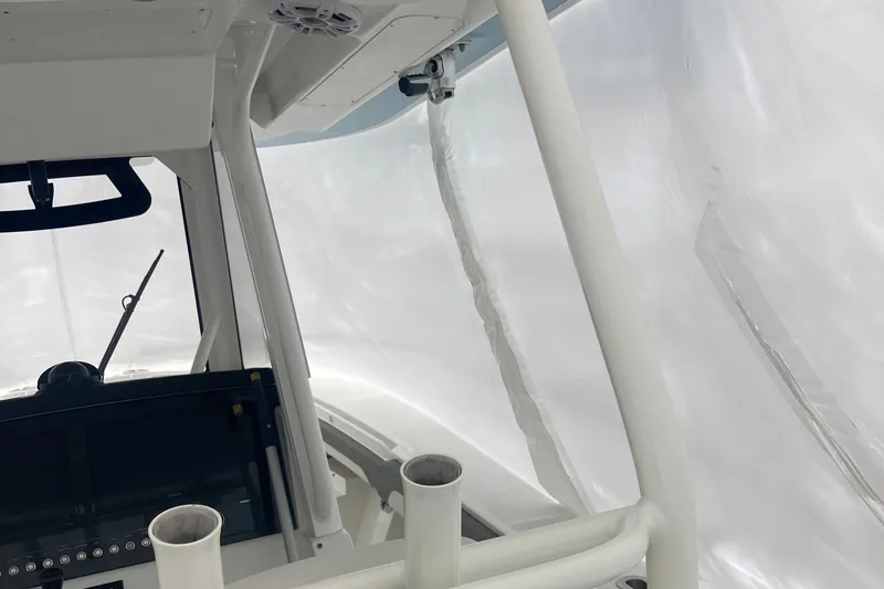  Yacht Photos Pics Interior view of a 2022 Regulator 34 boat with protective covering.