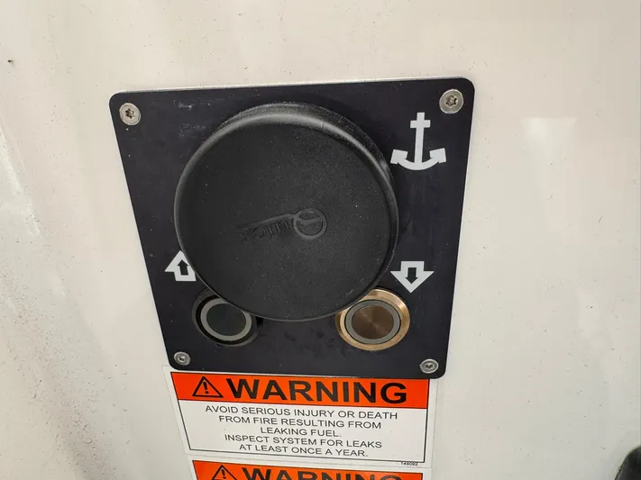 Xanadu Yacht Photos Pics Warning label and control panel on 2024 Beneteau Oceanis 34.1 sailboat.