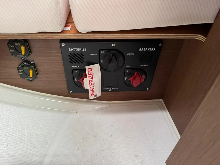 Xanadu Yacht Photos Pics Control panel of 2024 Beneteau Oceanis 34.1 yacht, featuring battery and breaker switches.
