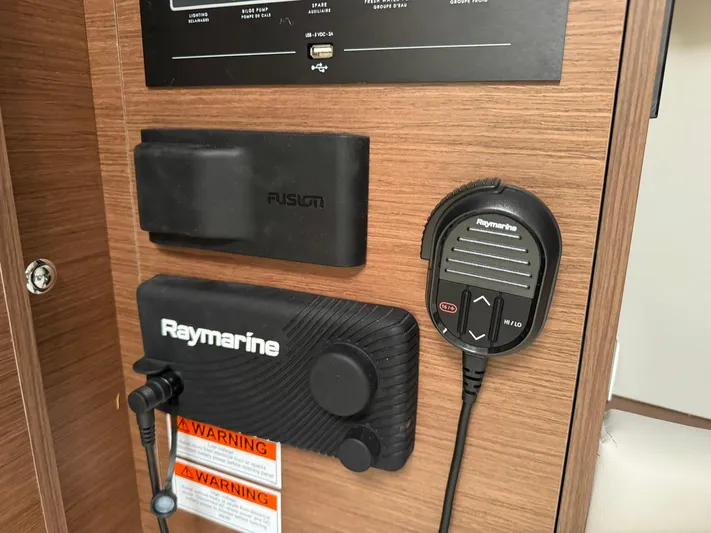 Xanadu Yacht Photos Pics Control panel with Raymarine and Fusion devices on 2024 Beneteau Oceanis 34.1 yacht.