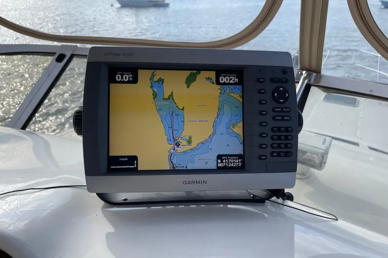  Yacht Photos Pics Garmin GPS on 2000 Sea Ray 400 Sedan Bridge, displaying nautical map.