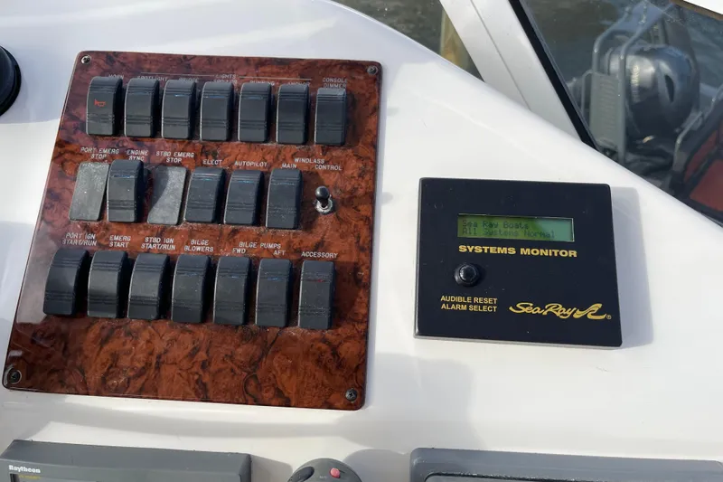  Yacht Photos Pics Control panel of a 2000 Sea Ray 400 Sedan Bridge with systems monitor display.