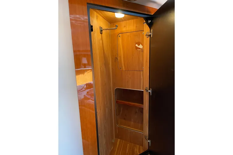  Yacht Photos Pics Wooden interior closet on 2000 Sea Ray 400 Sedan Bridge yacht.