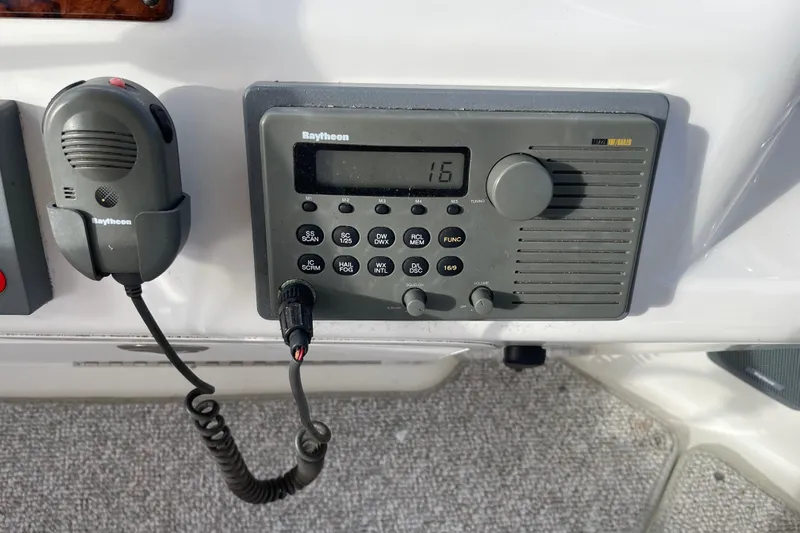  Yacht Photos Pics Raytheon marine radio on 2000 Sea Ray 400 Sedan Bridge yacht dashboard.