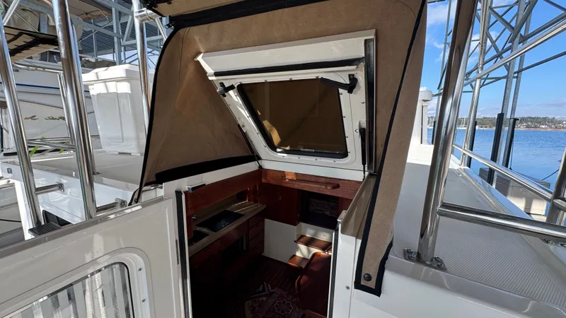 Clover Yacht Photos Pics Salon Entry with Dutch Door Open & Bimini