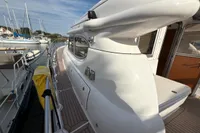 2023 Elling E4 yacht docked, showcasing sleek design and spacious deck.