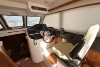 2023 Elling E4 yacht interior helm with steering wheel and navigation controls.