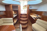 Luxurious 2023 Elling E4 yacht interior with wooden finishes and modern amenities.
