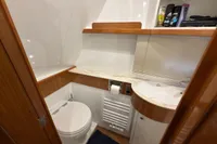 2023 Elling E4 yacht bathroom with modern fixtures and wooden accents.