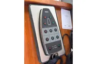 Remote control panel on 2023 Elling E4 yacht, featuring navigation and control buttons.