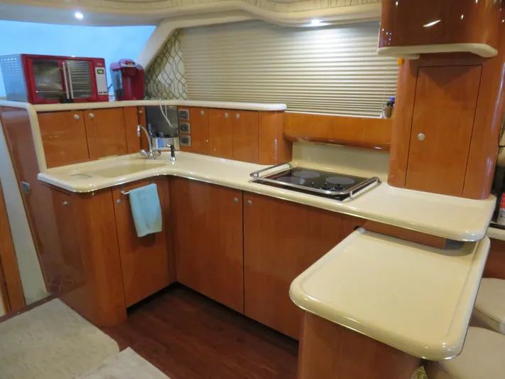  Yacht Photos Pics Interior of 1999 Sea Ray 480 DB yacht kitchen.
