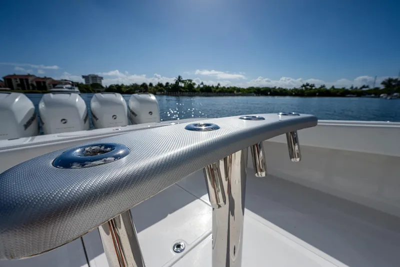  Yacht Photos Pics 2005 Venture 39 Open boat with multiple outboard engines on a sunny day.