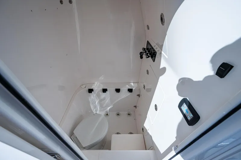  Yacht Photos Pics 2005 Venture 39 Open boat interior bathroom with toilet and shower.