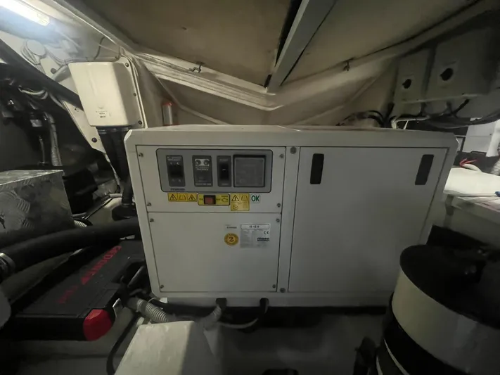  Yacht Photos Pics Engine room of 2010 Atlantis 55 yacht, featuring control panel and equipment.