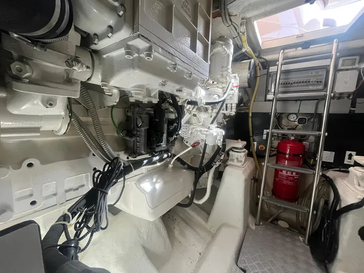  Yacht Photos Pics Engine room of 2010 Atlantis 55 yacht with mechanical components and safety equipment.