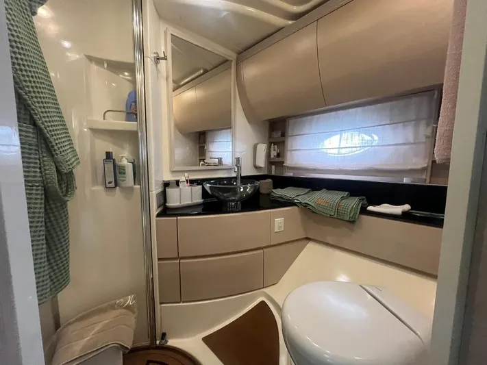  Yacht Photos Pics Luxurious bathroom in 2010 Atlantis 55 yacht with modern fixtures and elegant design.