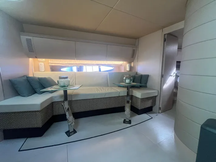  Yacht Photos Pics Luxurious interior of 2010 Atlantis 55 yacht with elegant seating and modern decor.