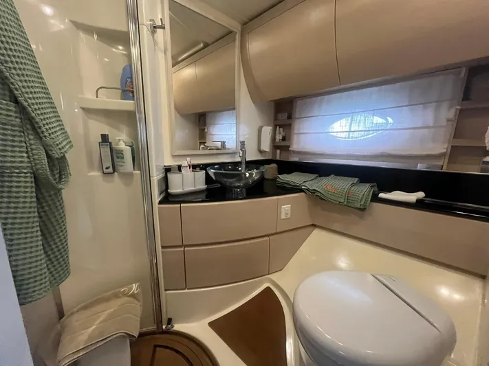  Yacht Photos Pics Luxurious bathroom in 2010 Atlantis 55 yacht with modern fixtures and elegant design.