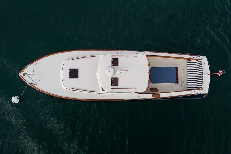 Seaker Yacht Photos Pics Aerial view of 2001 Hinckley Picnic Boat Classic on calm water.