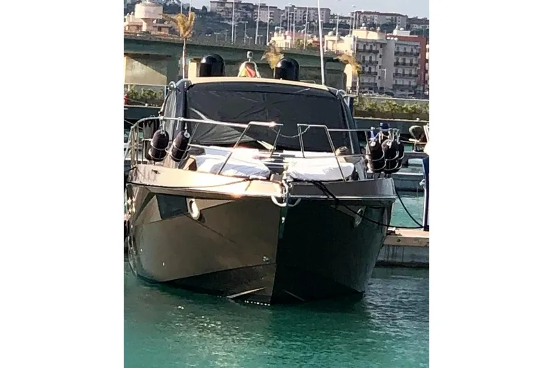  Yacht Photos Pics 2019 Cranchi M 44 HT yacht docked in a marina, front view.