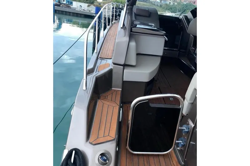  Yacht Photos Pics 2019 Cranchi M 44 HT yacht with sleek deck and modern seating.