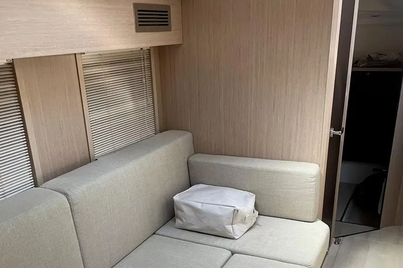  Yacht Photos Pics Interior of 2019 Cranchi M 44 HT yacht with beige seating and modern design.