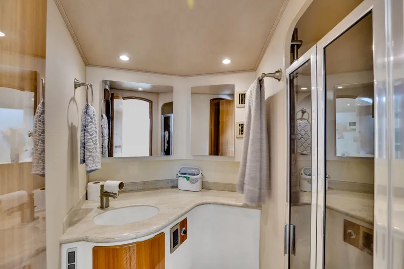  Yacht Photos Pics Luxurious bathroom in a 2011 Viking 42 Open yacht.