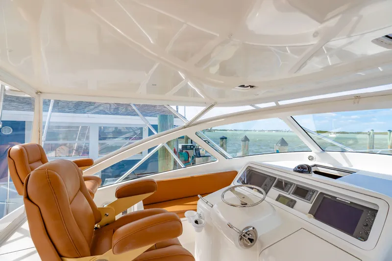  Yacht Photos Pics Interior view of 2011 Viking 42 Open yacht cockpit.