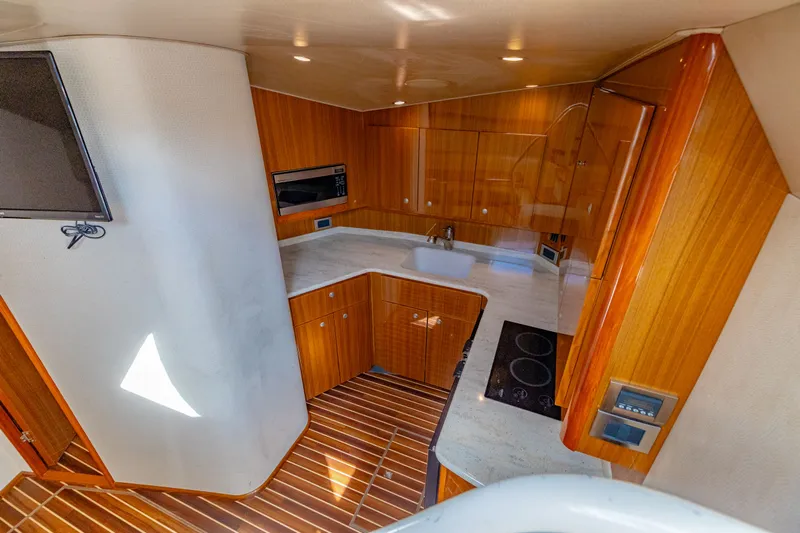  Yacht Photos Pics Interior of 2011 Viking 42 Open yacht featuring modern kitchen.