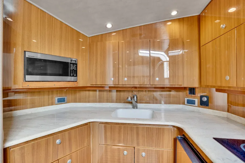  Yacht Photos Pics Interior of 2011 Viking 42 Open yacht featuring modern kitchen.