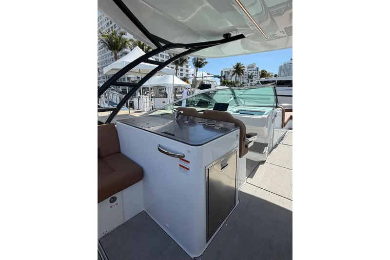  Yacht Photos Pics 2026 Jeanneau TH33 boat interior with modern amenities and sleek design.