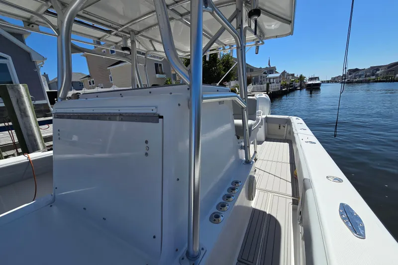  Yacht Photos Pics 2004 SeaVee 340B boat docked in a scenic canal setting.