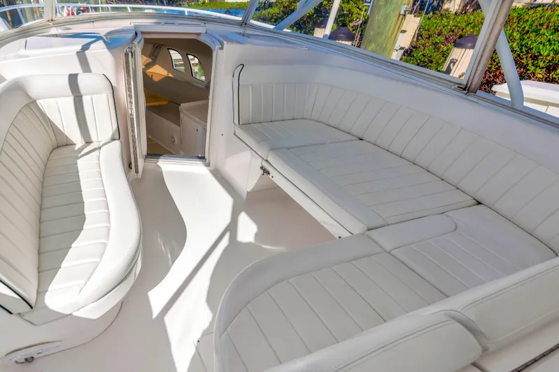  Yacht Photos Pics 2012 Intrepid 400 Cuddy interior with white seating and open cabin view.
