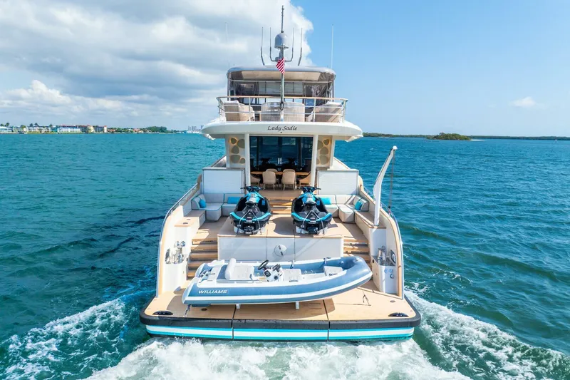 Lady Sadie Yacht Photos Pics Luxury yacht Van der Valk LeVen 90, 2019 model, cruising on open water with jet skis and tender.