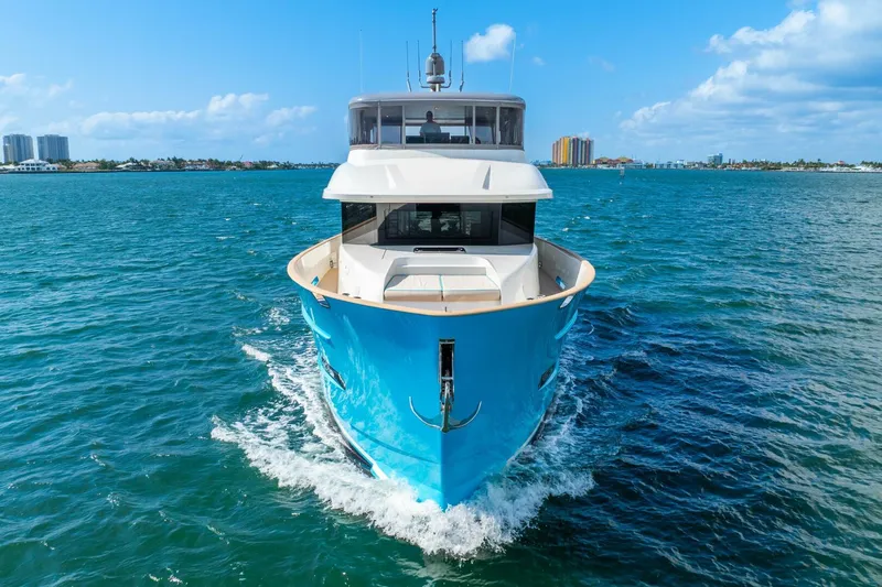 Lady Sadie Yacht Photos Pics Van der Valk LeVen 90 yacht cruising on blue ocean, 2019 model, clear sky background.